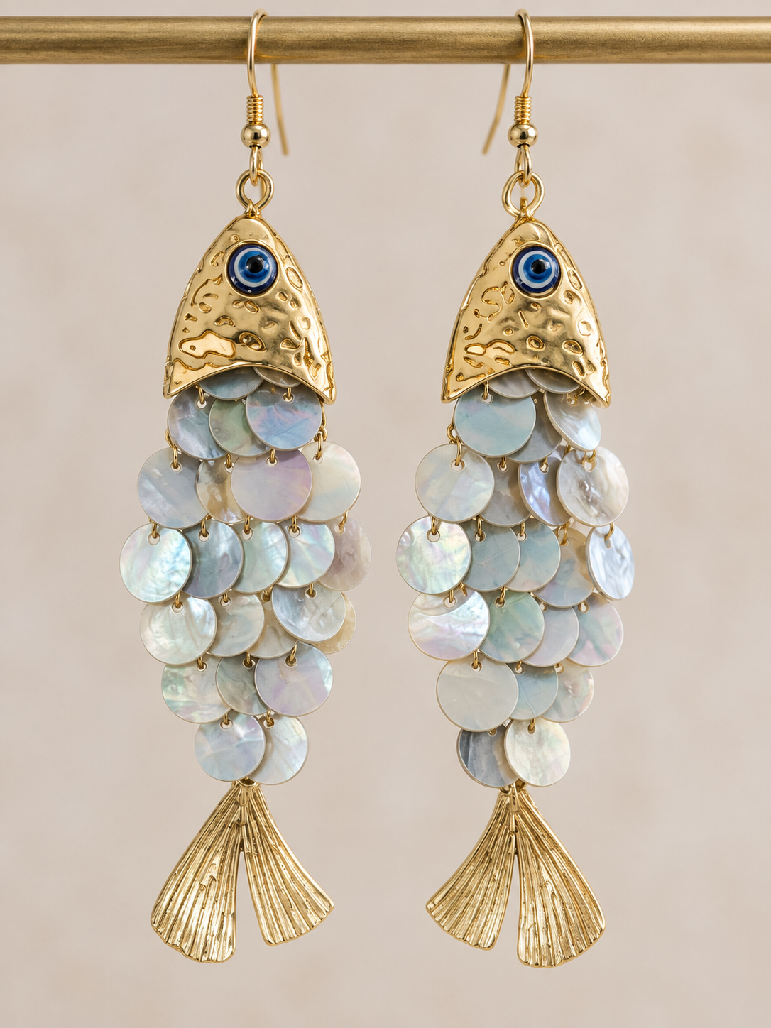 Gold plated fish earrings with mother of pearl beads