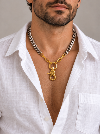 Big Clasp Necklace worn by a man in a white linen shirt
