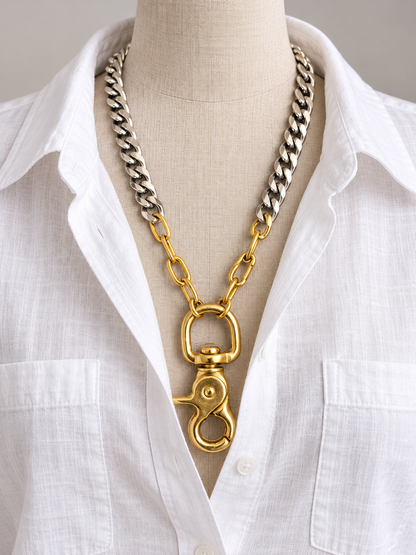 Mixed-Metal Clasp Necklace styled on a white linen shirt mannequin