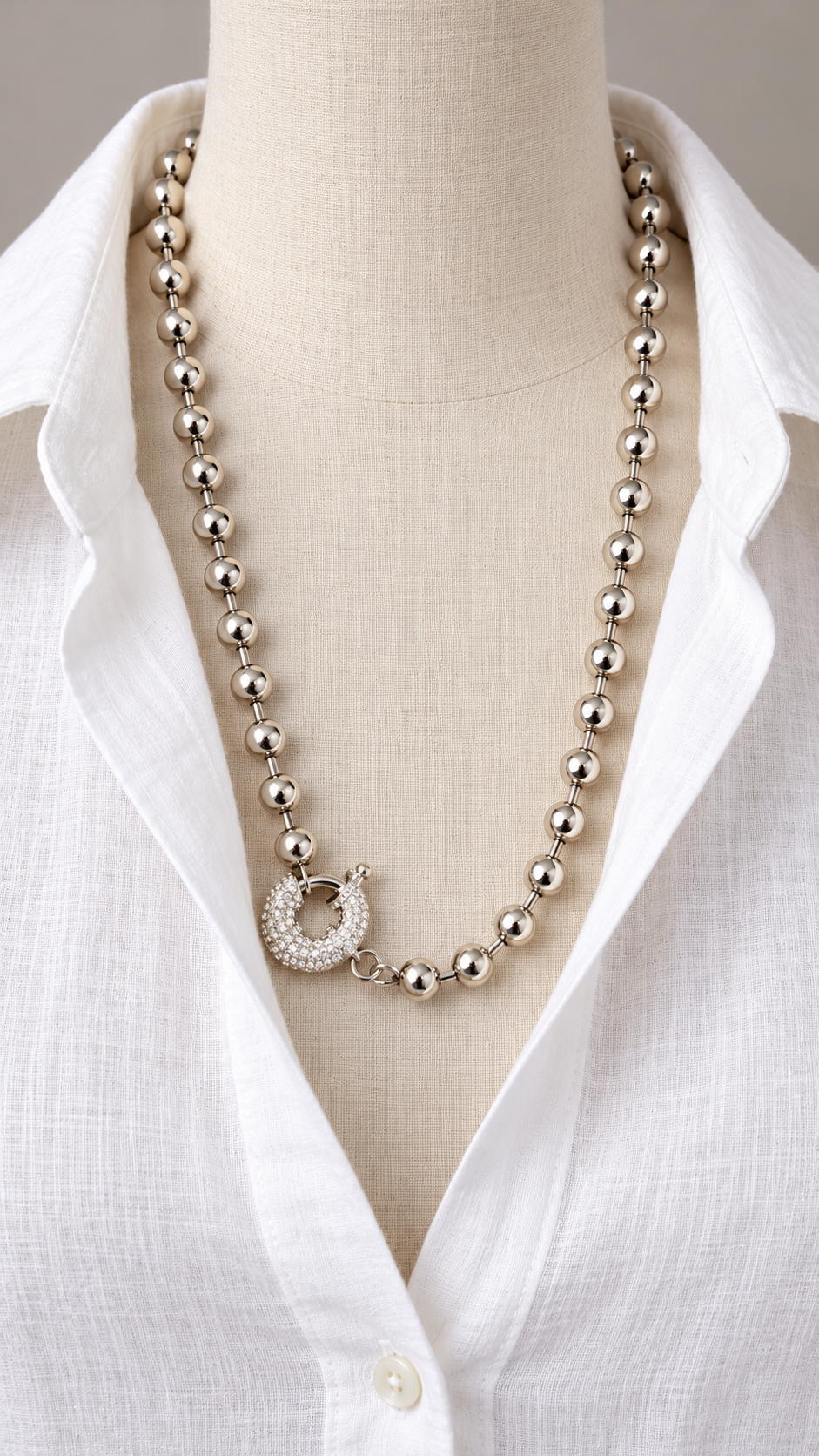 Órbita silver-tone beaded necklace with pavé rhinestone clasp